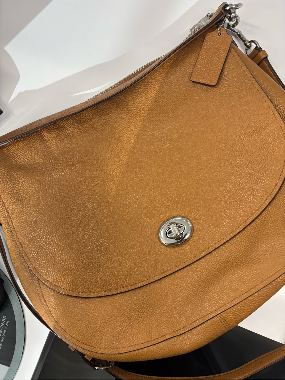 Coach Pebbled Leather Saddle Shoulder Bag in Tan